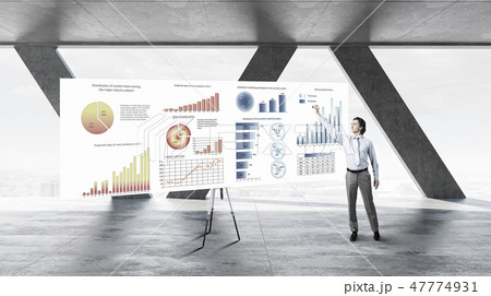 Businessman in top level office Businessman in top level office 47774931