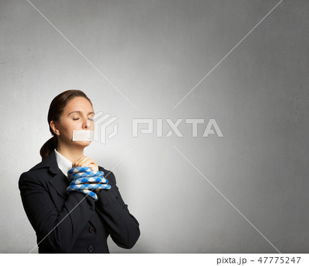 Speechless woman with tired hands Speechless woman with tired hands 47775247