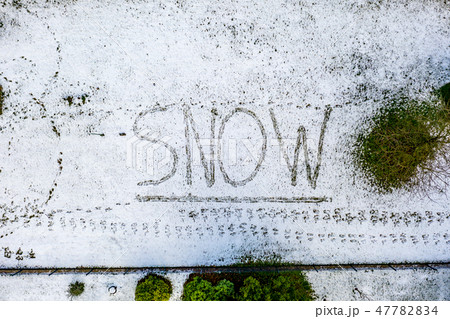 Flying above the word snow written in snow 47782834