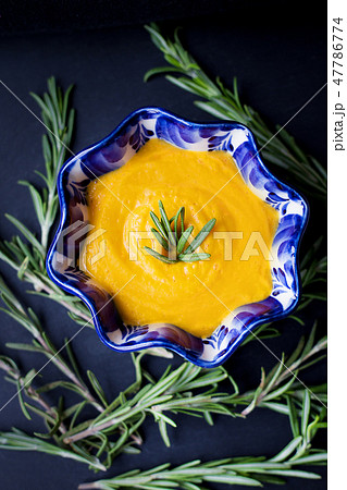 pumpkin soup in a plate 47786774