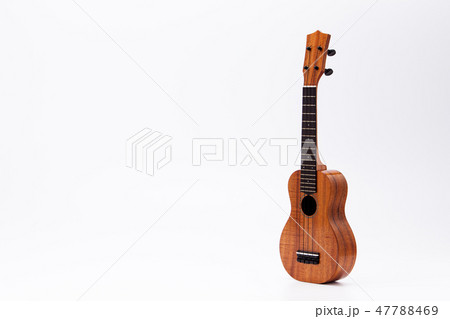 The ukulele guitar isolated on the white backgroun 47788469