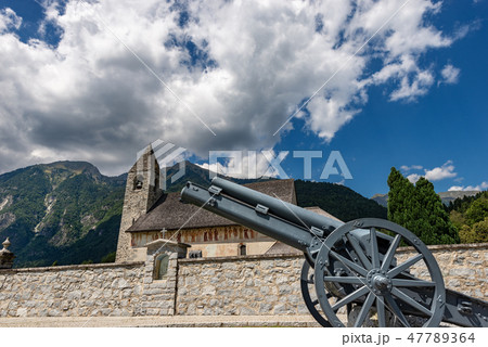 Church of Pinzolo with war cannon - Trentino Italy 47789364