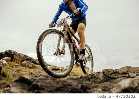 cyclist on dirty mountain bike cyclist on dirty mountain bike 47790202