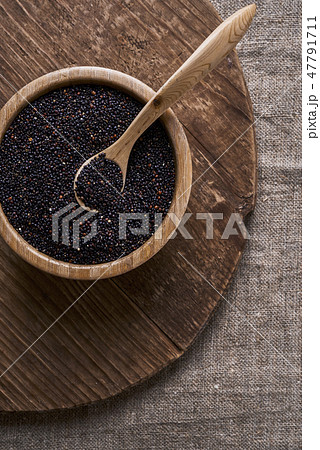 bowl with raw black quinoa bowl with raw black quinoa 47791711