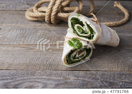 wrapped sandwiches with spinach and cream cheese 47791766