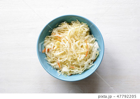 Blue bowl of fermented cabbage from above Blue bowl of fermented cabbage from above 47792205