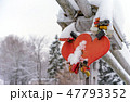 wedding locks and wedding hearts covered with snow 47793352