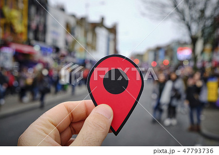 man with red marker in Candem High Street, London man with red marker in Candem High Street, London 47793736