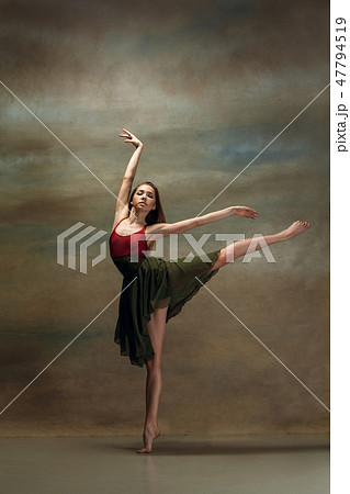 The woman dancing on gray The woman dancing on gray 47794519