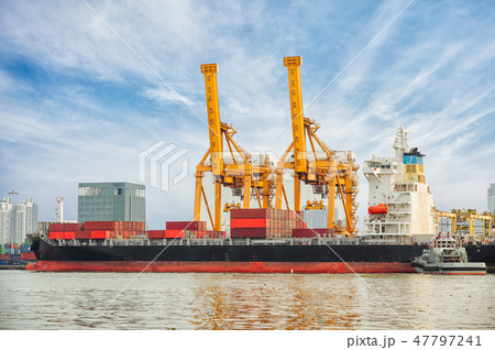 Container Cargo ship with working crane bridge in Container Cargo ship with working crane bridge in 47797241
