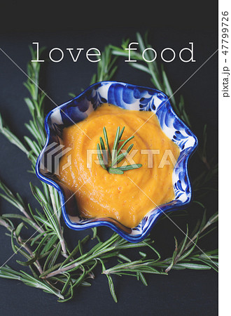 pumpkin soup in a plate 47799726