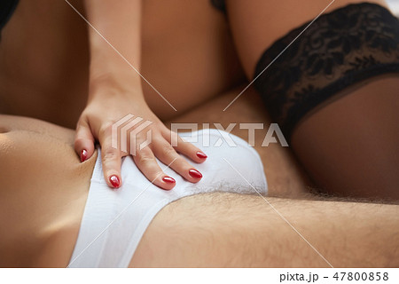 Woman touching man's private part. Woman touching man's private part. 47800858