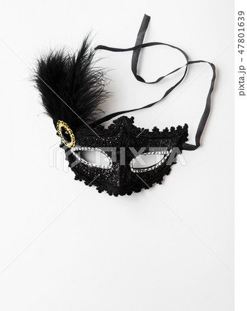 Black carnival mask on white background Black carnival mask on white background 47801639