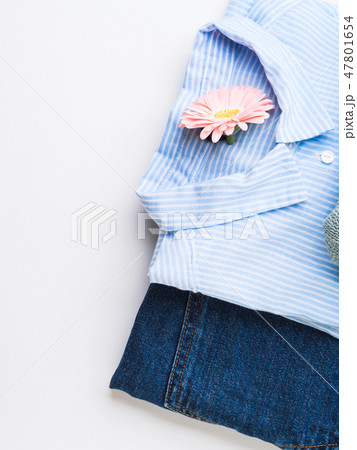 Folded female clothes on white. Fashion flat lay 47801654