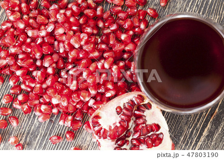 Red pomegranate on table 47803190