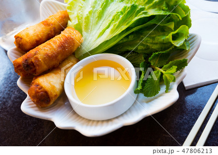 Nem rolls with lettuce and sauce Nem rolls with lettuce and sauce 47806213