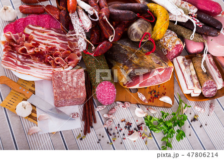 Variety of meats on table Variety of meats on table 47806214