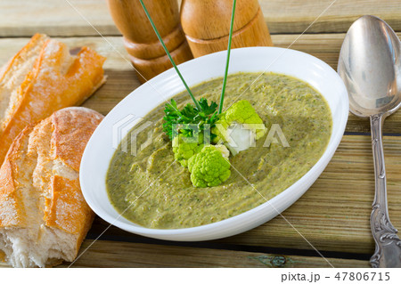 Cream soup of broccoli with bread Cream soup of broccoli with bread 47806715