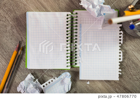 Notebook pages with writing materials 47806770
