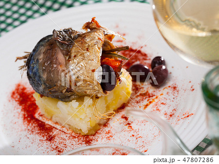 Rolls-up of fillet of mackerel with olives and rosemary Rolls-up of fillet of mackerel with olives and rosemary 47807286