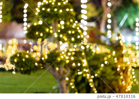 Blurred Decorative outdoor string lights hanging  Blurred Decorative outdoor string lights hanging  47810316