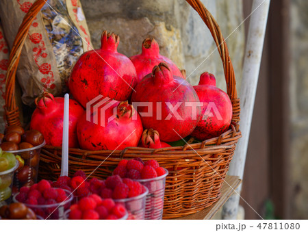 Pomegranates in basket for juice making Pomegranates in basket for juice making 47811080