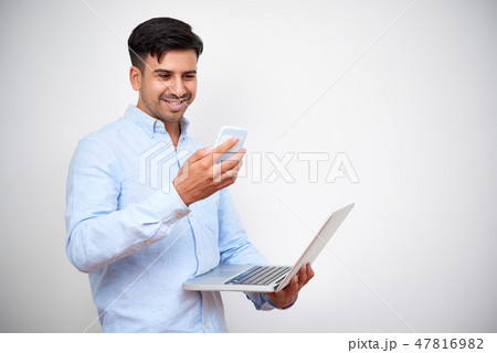 Man enjoying technology and devices Man enjoying technology and devices 47816982