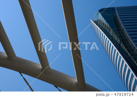 Modern skyscrapers in business district against bl 47819724