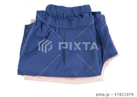Brown and blue short pants isolated on white 47821979