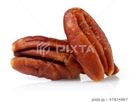 Peeled pecan nuts isolated on white Peeled pecan nuts isolated on white 47824867