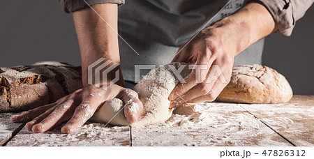 Chef making fresh dough for baking Chef making fresh dough for baking 47826312