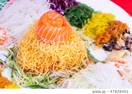 Close-up of Yee Sang or Yusheng with raw fish Close-up of Yee Sang or Yusheng with raw fish 47826401