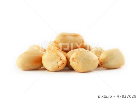 Roasted peanuts peeled and isolated on a white background Roasted peanuts peeled and isolated on a white background 47827029
