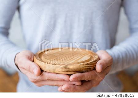 nature protection man hand wooden mockup 47828015