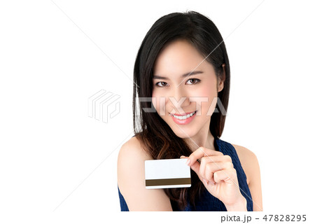 Young Asian woman presenting credit card in hand 47828295