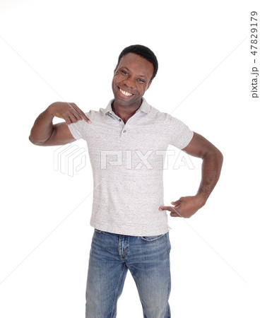 African man standing and pointing to himself African man standing and pointing to himself 47829179