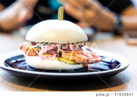 Delicious pork belly bao or Chinese burger Delicious pork belly bao or Chinese burger 47830647