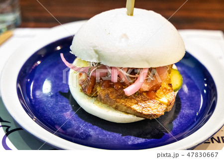 Delicious pork belly bao or Chinese burger Delicious pork belly bao or Chinese burger 47830667