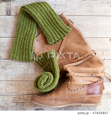 high boot and knitted green wood legwarmers 47830807