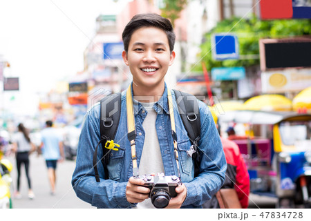 Asian backpacking tourist photographer in Bangkok Asian backpacking tourist photographer in Bangkok 47834728