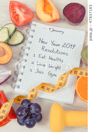 Goals for new year 2019 in notepad and fruits Goals for new year 2019 in notepad and fruits 47837165