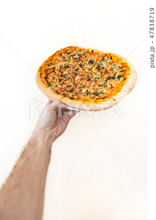 hand hold pizza isolate on white background 47838719