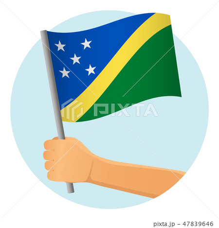 Solomon Islands flag in hand 47839646