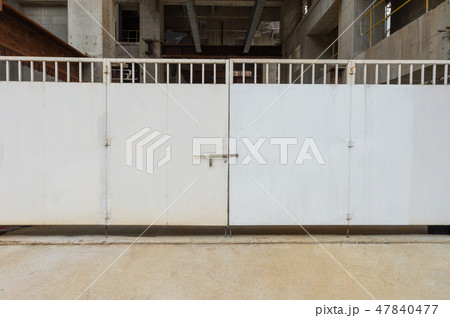 sidewalk by street wall & door sidewalk by street wall & door 47840477