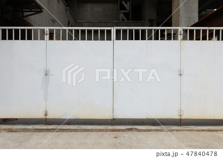 sidewalk by street wall & door sidewalk by street wall & door 47840478