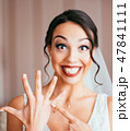 Portrait of pretty laughing bride 47841111