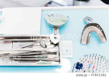 Close up dental nozzles or drill heads for the drill. Dental bur equipment. Dental hygiene and 47841582