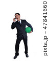 Businessman argue on phone and holding ball in his hand. 47841660