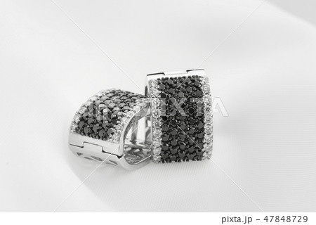 White Gold Earrings With Black Diamonds On Soft 47848729