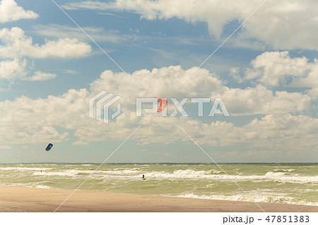 people are engaged in kitesurfing people are engaged in kitesurfing 47851383